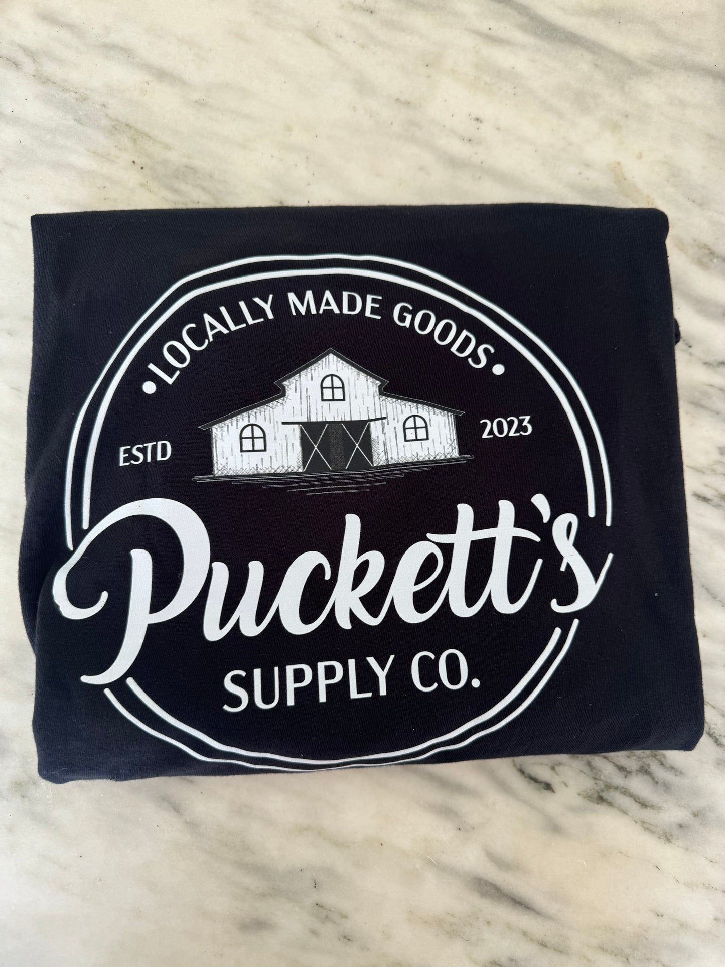 Puckett’s Suppy Co. Black Logo Tee